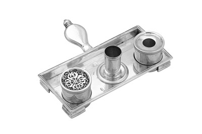 Lot 562 - A George I sterling silver desk ink stand or standish, London 1726 by IB, possibly for John Barbot (reg. 22nd July 1726)