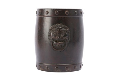Lot 683 - A CHINESE WOOD LION MASK BRUSH POT.