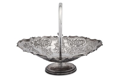 Lot 443 - An Edwardian sterling silver swing handled fruit or bread basket, Birmingham 1903 by Norton & White