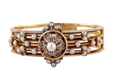 Lot 64 - A pearl and diamond bangle, circa 1900