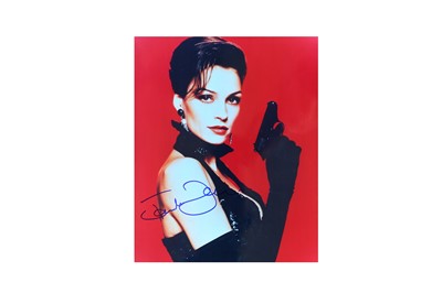 Lot 195 - James Bond.- Famke Janssen