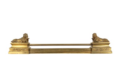 Lot 137 - A MID 19TH CENTURY FRENCH GILT BRONZE ADJUSTABLE FENDER DECORATED WITH LIONS