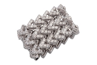 Lot 10 - A flexible diamond eternity ring