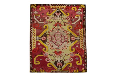 Lot 303 - AN ANTIQUE KHOTAN RUG, EAST TURKESTAN