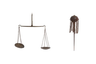 Lot 373 - A STEEL DECORATIVE TENT POLE AND A COPPER ALLOY SCALE