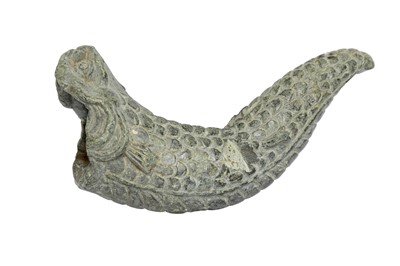 Lot 257 - A CARVED GREY SCHIST MAKARA SPOUT