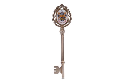 Lot 857 - A GEORGE VI STERLING SILVER GILT AND ENAMEL PRESENTATION KEY, BIRMINGHAM 1937 BY LLOYD, PAINE & AMIEL