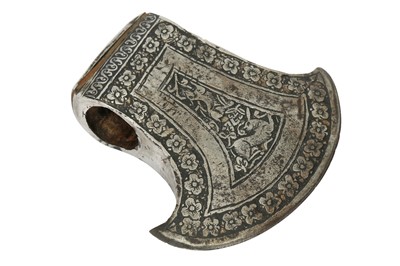 Lot 434 - AN ENGRAVED STEEL AXE HEAD (TABARZIN)