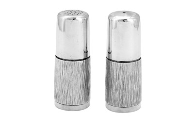 Lot 423 - A pair of Elizabeth II modernist sterling silver cruets, London 1970 by Gerald Benney (1930-2008)