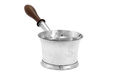 Lot 556 - A George II sterling silver brandy pan, London 1730 by Elizabeth Goodwin (reg. 2nd Dec 1729)