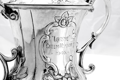 Lot 170 - A mid-19th century Indian colonial silver twin handled cup and cover, Calcutta circa 1860 by Hamilton and Co