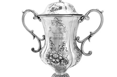 Lot 170 - A mid-19th century Indian colonial silver twin handled cup and cover, Calcutta circa 1860 by Hamilton and Co