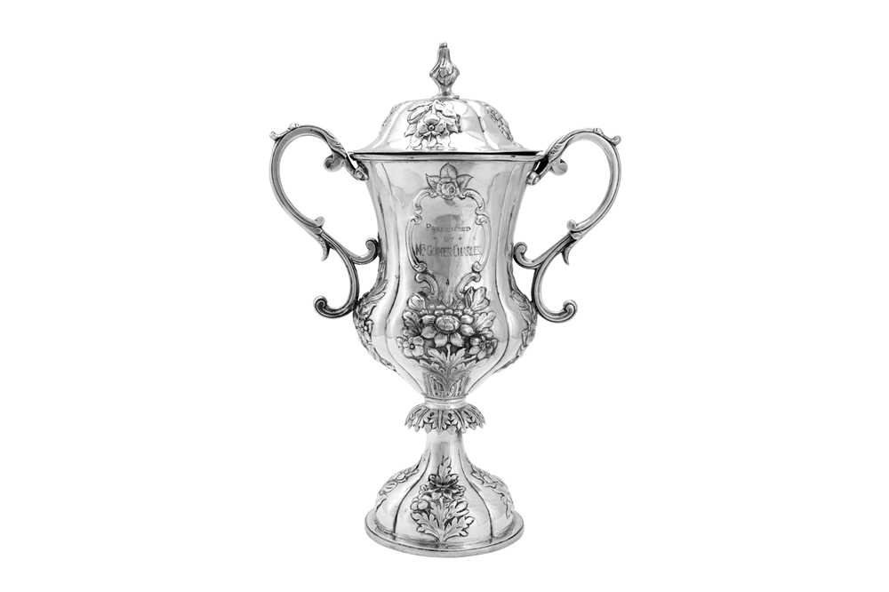 Lot 170 - A mid-19th century Indian colonial silver twin handled cup and cover, Calcutta circa 1860 by Hamilton and Co