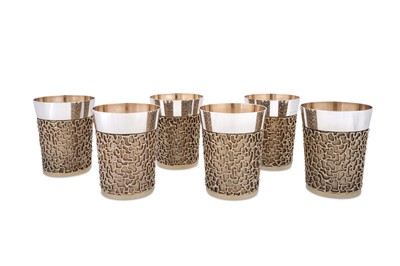 Lot 425 - A fine set of six Elizabeth II modernist parcel gilt sterling silver beakers, London 1968/69 by Stuart Devlin (1931-2018)