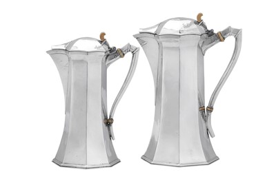 Lot 438 - A fine George VI 'Arts and Crafts' sterling silver café au lait set, London 1937 by Omar Ramsden (1873–1939)