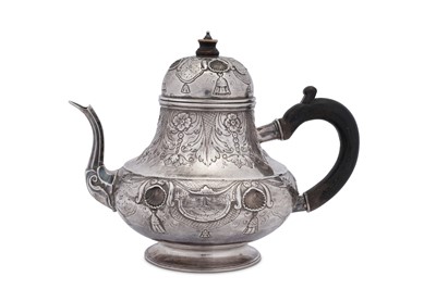 Lot 115 - An early 18th century Dutch silver teapot, Harlem 1736 by Jan Verdoes (active 1734-68)