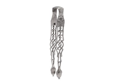 Lot 363 - A pair of George III provincial sterling silver sugar tongs, York circa 1780 by John Hampston and John Prince