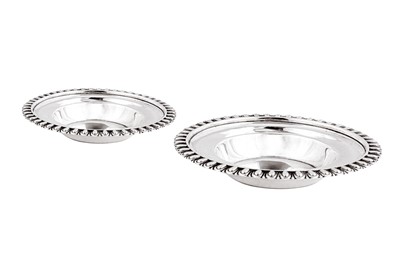 Lot 459 - A pair of George III sterling silver glass salt stands, London 1806 by John Emes (this mark reg. 10th Jan 1798)