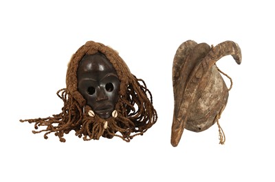 Lot 544 - A TRIBAL HARDWOOD MASK IN THE FORM OF AN ANTELOPE, 20TH CENTURY