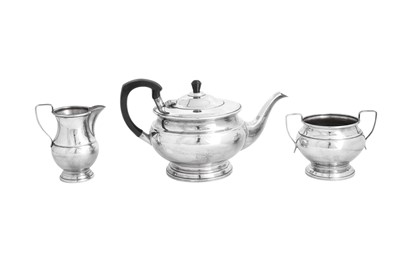 Lot 592 - A GARRARD SILVER PLATED THREE PIECE TEA SET, MID 20TH CENTURY