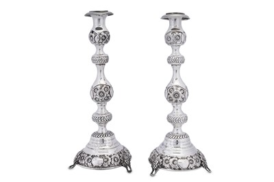 Lot 105 - A pair of George V sterling silver sabbath candlesticks, London 1918 by Rosenzweig, Taitelbaum & Co (Jacob Rozenzweig)