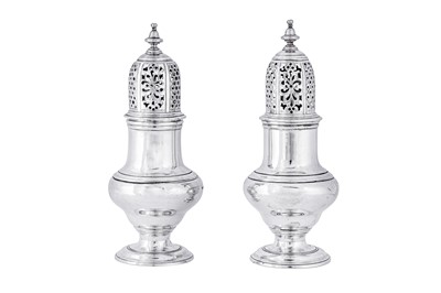 Lot 475 - A pair of George II sterling silver pepper casters, London 1743 by Samuel Wood (first reg. 3rd July 1733)