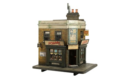 Lot 206 - MODELS: A LARGE SCRATCH BUILT MODEL OF A CORNER SHOP, 20TH CENTURY