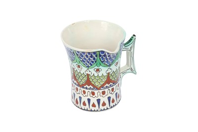Lot 354 - AN IZNIK-STYLE CANTAGALLI POTTERY CREAMER