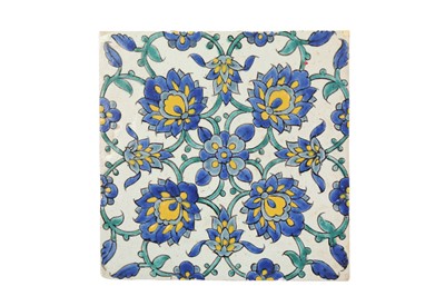 Lot 281 - A POLYCHROME-PAINTED CUERDA SECA POTTERY TILE