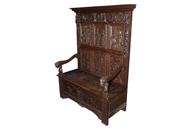 Lot 74 - A CARVED OAK HALL SETTLE, CIRCA 1900