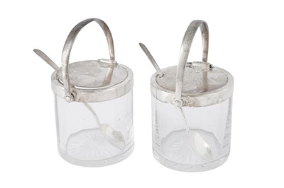 Lot 609 - A PAIR OF GEORGE V STERLING SILVER MOUNTED CONSERVE POTS, BIRMINGHAM 1935 BY GOLDSMITHS AND SILVERSMITHS