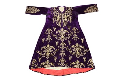 Lot 412 - AN ANKARA CAFTAN OF PURPLE SILK VELVET