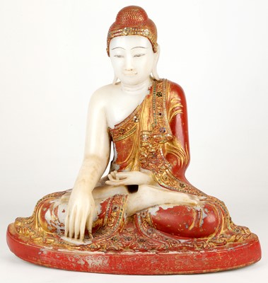 Lot 291 - A LARGE BURMESE PARCEL-GILT MARBLE FIGURE OF BUDDHA SAKYAMUNI.