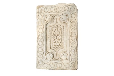 Lot 263 - A CARVED WHITE MARBLE RELIEF WITH HORNED DEVILS