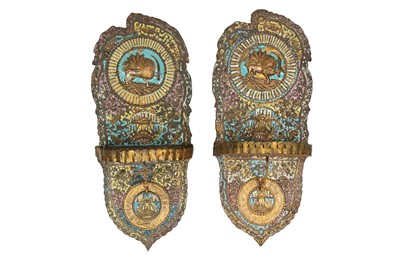 Lot 292 - A PAIR OF POLYCHROME-ENAMELLED COPPER ALLOY WALL TURBAN STANDS