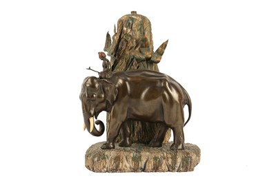 Lot 247 - AN EARLY 20TH CENTURY VIENNESE PATINATED AND PAINTED ALABASTER LAMP DEPICTING A MAN WITH ELEPHANT