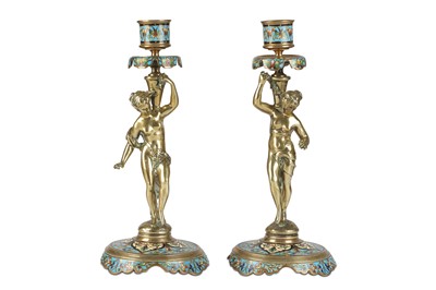 Lot 250 - A PAIR OF LATE 19TH CENTURY FRENCH BRONZE AND CHAMPLEVE ENAMEL FIGURAL CANDLESTICKS