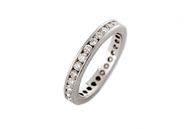 Lot 184 - De Beers | A diamond eternity ring, 2011