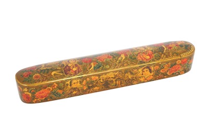 Lot 355 - A QAJAR LACQUERED PAPIER-MÂCHÉ PEN CASE (QALAMDAN)
