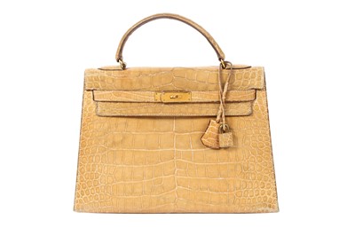 Lot 223 - λ Hermes Beige Shiny Crocodile Kelly Sellier 32
