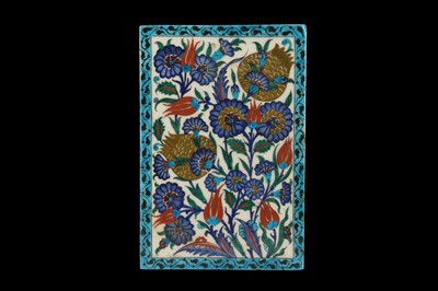 Lot 235 - A 20TH CENTURY GLAZED POTTERY IZNIK TILE