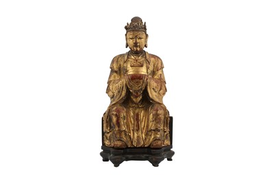 Lot 14 - A CHINESE GILT-LACQUER WOOD FIGURE OF AN ATTENDANT.