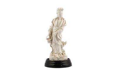 Lot 421 - A CHINESE BLANC-DE-CHINE FIGURE OF GUANYIN.