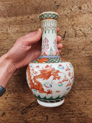 Lot 27 - A PAIR OF CHINESE FAMILLE ROSE 'DRAGON' BOTTLE VASES.