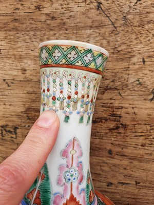 Lot 27 - A PAIR OF CHINESE FAMILLE ROSE 'DRAGON' BOTTLE VASES.