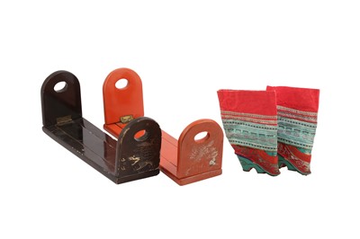 Lot 617 - A PAIR OF CHINESE LACQUERED WOOD BOOK HOLDERS TOGETHER WITH A PAIR OF EMBROIDERED SHOES.