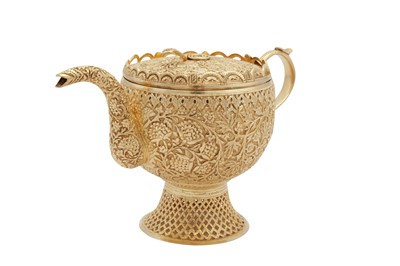 Lot 148 - An early 20th century Anglo - Indian unmarked silver gilt three-piece tea service, Kashmir circa 1900
