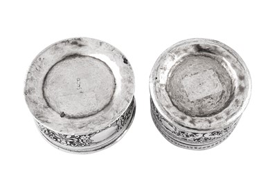 Lot 180 - Two mid- 20th century Burmese unmarked silver betel boxes or dressing table jars, circa 1950