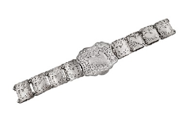 Lot 211 - An early 20th century Sumatran (Indonesian) unmarked silver belt and buckle, probably Padang circa 1900