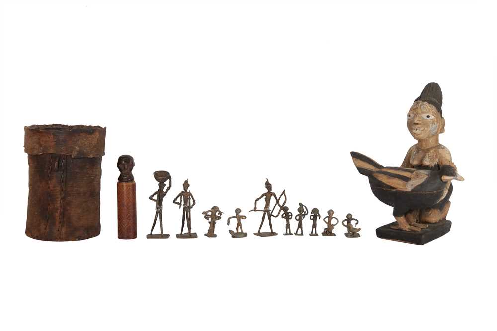 Lot 540 - A CARVED AND PAINTED TRIBAL FIGURE OF A SEATED WOMAN,  20TH CENTURY